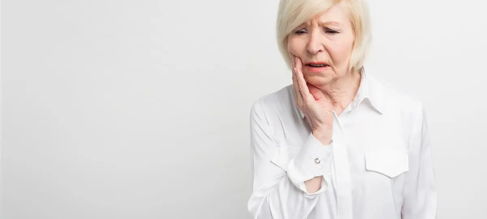 elderly woman with jaw pain