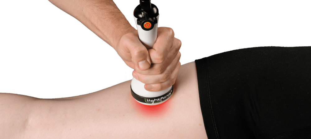 laser treatment on patient hamstrings